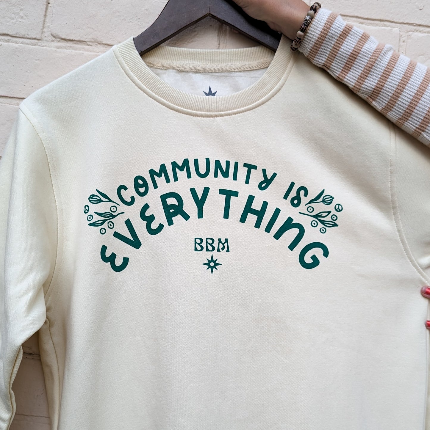 "Community Is Everything" Ivory Crewneck Sweater