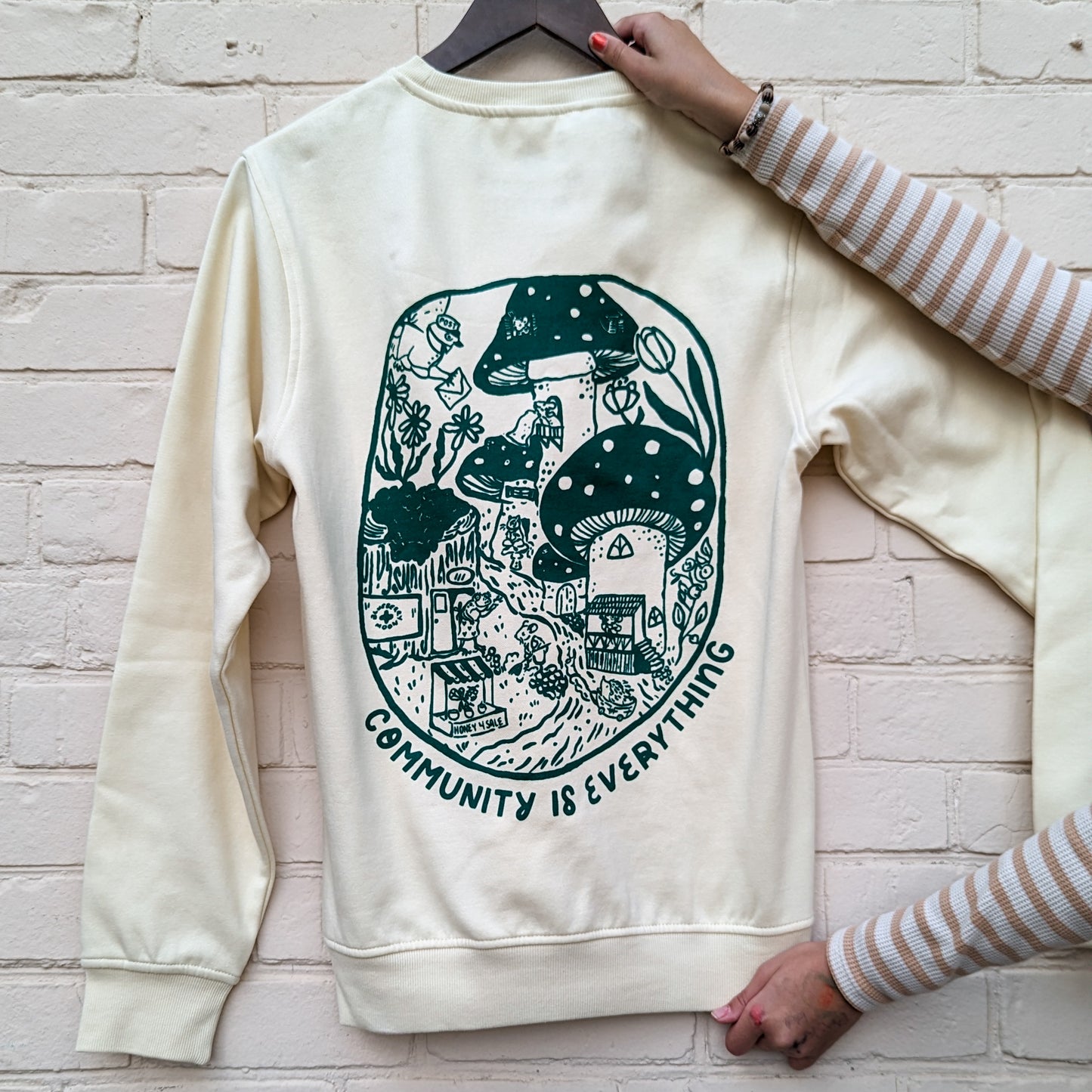 "Community Is Everything" Ivory Crewneck Sweater