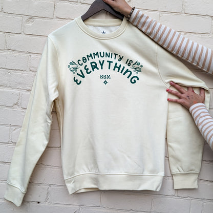 "Community Is Everything" Ivory Crewneck Sweater